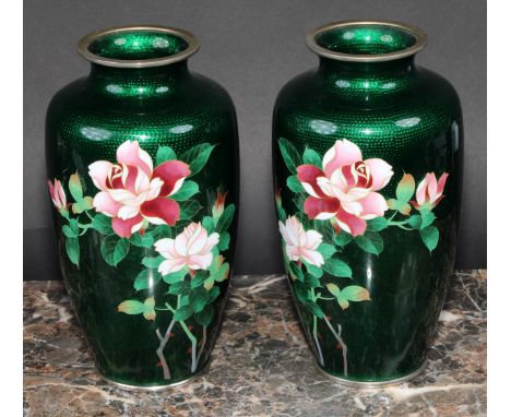 A pair of Japanese ginbari and cloisonné enamel ovoid vases, each decorated with flowers and bamboo on a green ground, 19cm h