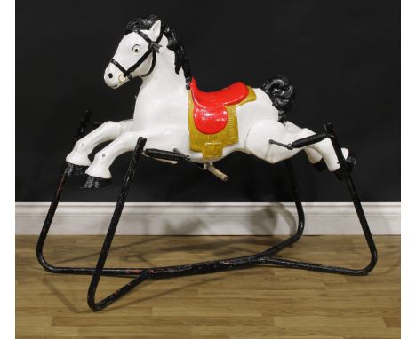 Toys &amp; Juvenalia - a 1960's painted pressed steel rocking horse on springs, mounted upon a frame, 100cm long, probably by