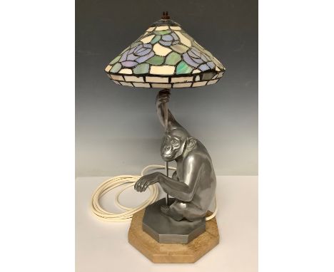 Boxes &amp; Objects - Lights - a cast chimpanzee lamp, after Lawson Wood, with leaded Art Nouveau shade in the form of a para