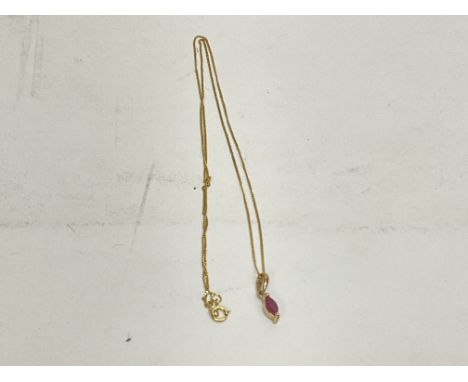 9ct yellow gold necklace set with a marquise cut ruby of 0.25ct approx, boxed