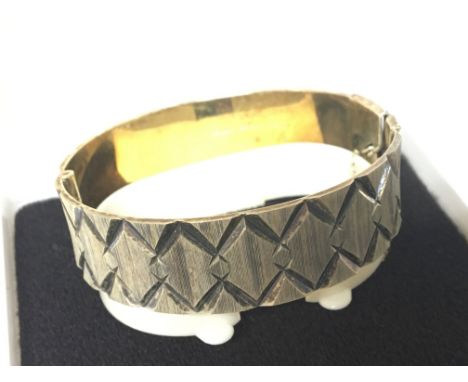 A modern design Silver gilt bangle in a fitted box weight 33g