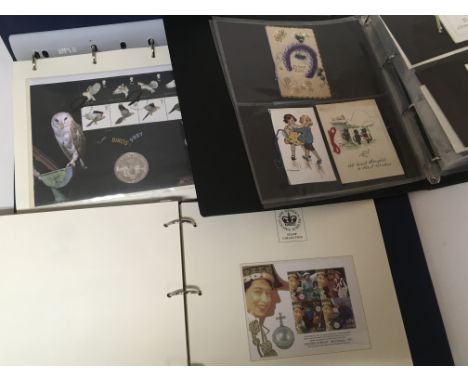 Three Albums containing Presentation Packs including High Value commemorative.coin covers and first day covers and a few vint