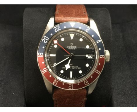 A boxed Tudor GMT Black Bay Pepsi dial chronometer watch with date aperture, snowflake hands and contrasting hour markers on 