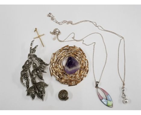 A MARCASITE FLORAL PATTERN BROOCH A MARCASITE SILVER CLIP ON EARRING AN AMETHYST AND GILT METAL NEST PATTERN BROOCH, A GILT M