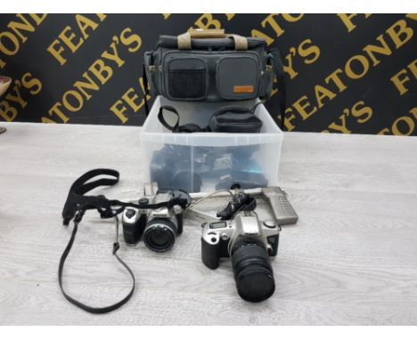 A LOT OF CAMERA EQUIPMENT INCLUDES CANON EOS500 PENTAX X-5 ETC