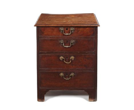 A George III mahogany night commode The rectangular moulded top above a pair of simulated drawers and a deep drawer simulated