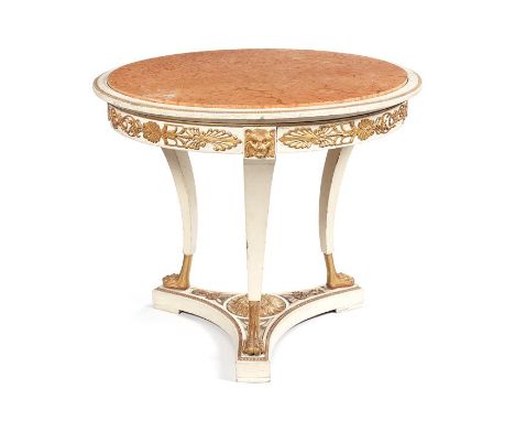 A late 19th century Italian white painted and parcel gilt centre table in the Empire styleThe circular moulded top with inset