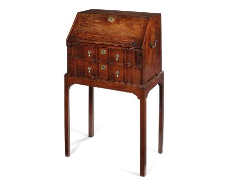 A small 18th century Chinese-Export bureau on an associated English mahogany stand The rectangular top above a crossbanded fa