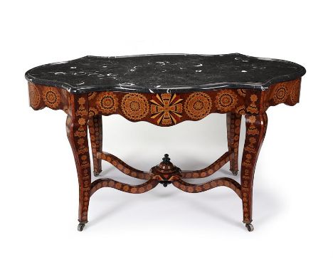 A 19th century Italian rosewood, tulipwood crossbanded and specimen wood stellar parquetry centre table The shaped Almond bla