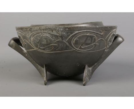 An Art Nouveau Tudric pewter twin handle bowl designed by Archibald Knox for Liberty &amp; Co. Stamped with registered number