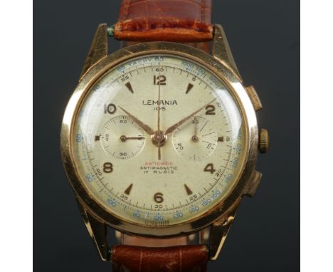 An 18ct gold Lemania 105 manual chronograph wristwatch. Having Arabic and baton markers, centre seconds and two subsidiary di
