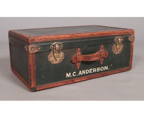 A vintage French leather bound suitcase. Having canvas tray insert. The locks stamped Surete.  