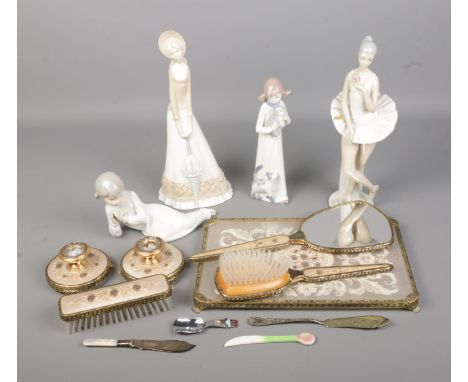A quantity of decorative items to include several lace inset dressing table set, Casades porcelain figure, Zaphir ceramic fig