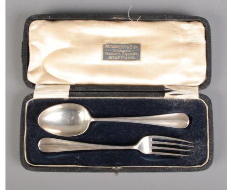 A cased James Dixon &amp; Sons silver spoon and fork, hallmarked for Sheffield 1918. Approx. weight 61.45g  