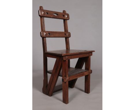 An Arts &amp; Crafts mahogany metamorphic library step chair. Height of steps 88.5cm.  