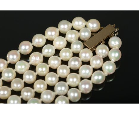 A vintage JKa three row pearl necklace with 9ct gold clasp.  