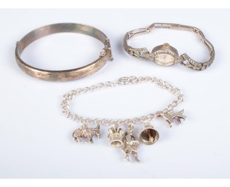A collection of silver accessories to include ladies Rotary silver and marcasite wristwatch, Bracelon Ltd. floral engraved ba