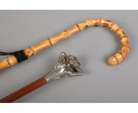 Two vintage parasols. One with Art Nouveau maiden pommel.  
