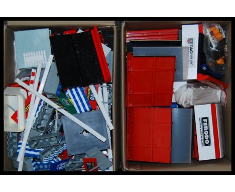 A large collection of 2x boxes of Ninco & Scalextric track & track side set up to include; spectator viewing platforms/ seati