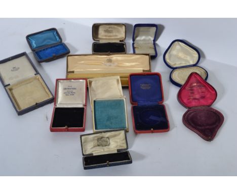 A collection of antique vintage jewellery boxes to include Kemp Bros, Sen Brothers, Regent Street, Hendersons of Dundee etc.
