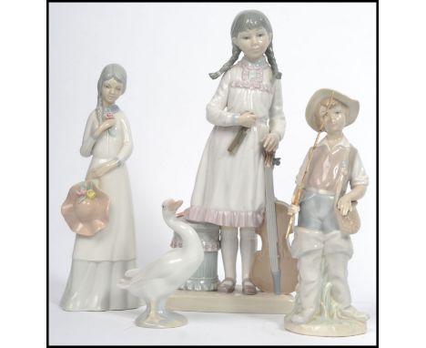 A group of three Lladro ceramic figures to include a Goose, boy with fishing rod and a girl with Cello together with a simila