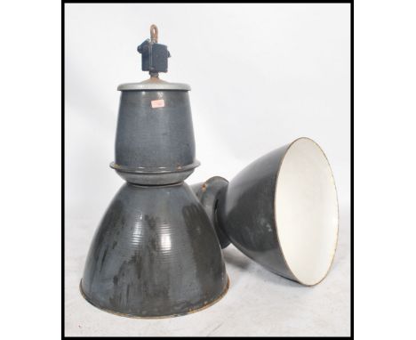 A pair of large vintage industrial 20th century factory black enamel ceiling lights. Each  retaining the original fixture poi