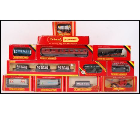 A collection of 12x 00 gauge Hornby railway trainset rolling stock wagons to include; R.434, R.136, R.220, R.232, R.6047, R.2