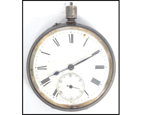 A gents silver hallmarked enamel faced pocket watch, Roman numeral chapter ring with subsidiary dial, inscription to the insi