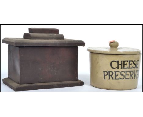 A vintage lidded ceramic cheese preserver with notation to front in bold black lettering reading CHEESE PRESERVER together wi