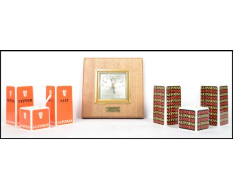 Two boxed retro sets of original Guinness three piece cruet sets in plastic together with a boxed Guinness barometer From a l