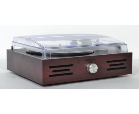 A contemporary two speed record player with built in speaker, lift up smoked perspex lid, Ondial to the front.