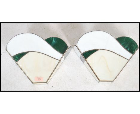 A pair of fluted stained and leaded, coloured glass wall sconce light fitment shades. Of wonderful colour and shape having br