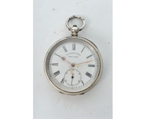 A vintage silver open faced pocket watch, the dial marked for HE Peck, London. Enamel face with roman numeral chapter ring, f