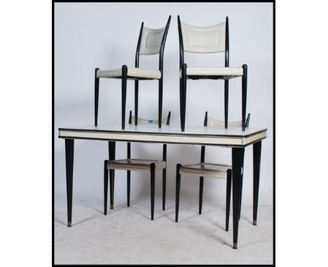 E. Gomme G-Plan - A set of four mid century ebonised ladder back dining chairs in the manner of Gio Ponti together with a mat