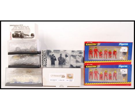 A collection of slot car kits & track side accessories to include; 2x Scalextric 8827 F1 pit stops crews, Fly GB Track TV & P