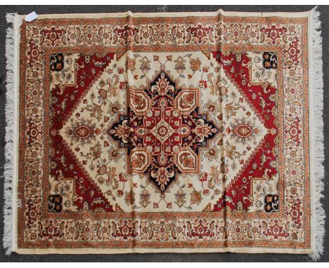 A large Iranian / Persian Keshan carpet - rug having beige  ground with geometric decoration and borders. Measures 1.90m x 1.