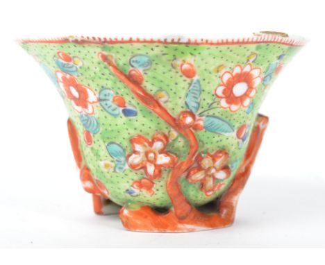 An 18th century Oriental Chinese ceramic libation cup Blanc De Chine having later European decoration, character marks to bas