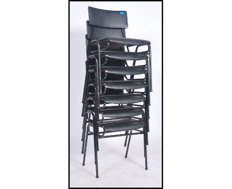 A retro vintage 20th century set of 7 stacking chairs of tubular construction with makers label for Remploy. Measures 79cms x