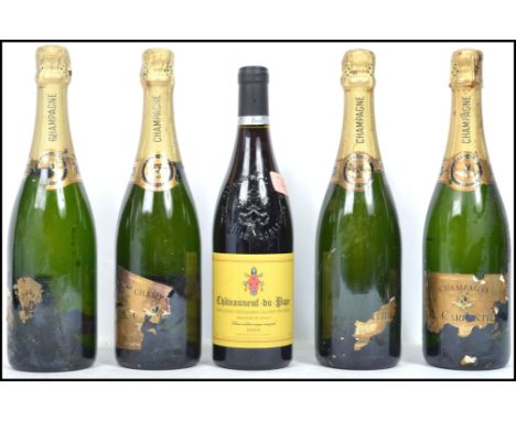 A collection of vintage champagne and wine to include a Chateaneuf Du Pape 2008, and four bottles of champagne. Highest measu