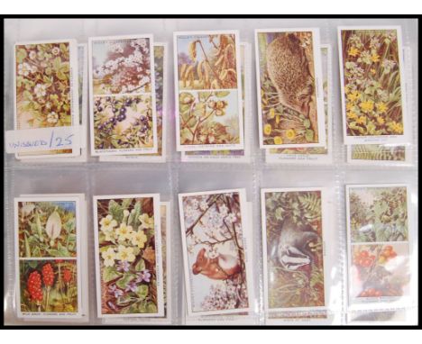 Cigarette Cards: An album of assorted vintage cigarette cards, all complete sets. From a large private collection, including 