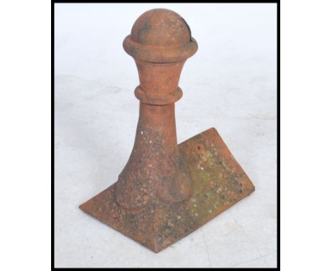 A vintage 19th century / 20th century architectural terracotta roof pitch tile having unusual tapering finial spherical ball