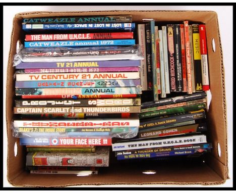 A collection of vintage retro collectors books, annuals & novels to include; Captain Scarlet & Thunderbirds, The Man From U.N