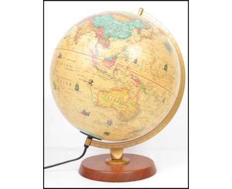 A vintage 20th century retro 1970s Danish Scan Globe of antique style raised on circular mount with gibb.