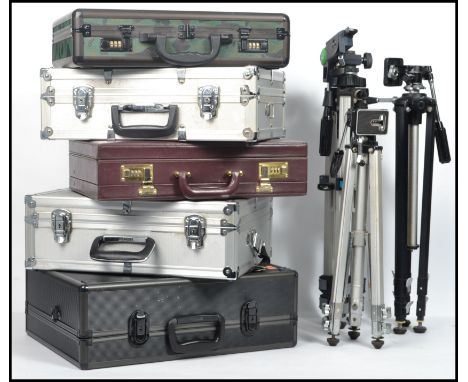 A group of five photography camera flight suitcases, of briefcase form, camo, silver etc all with foam interiors along with t