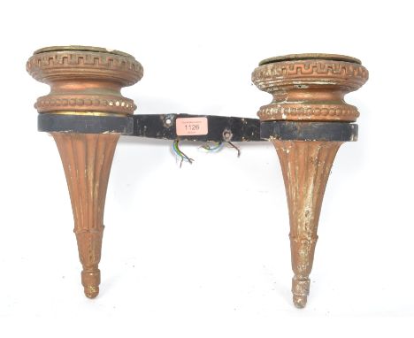 An early 20th century 1920s Art Deco Olympia style wall lamp having two twin gilt sconces in the form of torches, 