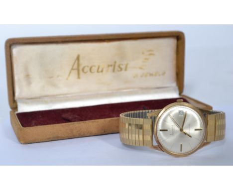 A vintage mid century Gents Accurist gold 21 jewel shockmaster wristwatch having qtr baton numerals, date aperture on expandi