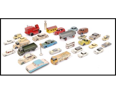 A collection of loose vintage Corgi, Matchbox & Dinky diecast model cars to include; Hudson Sedan, Garage, Army Wagon, Bedfor