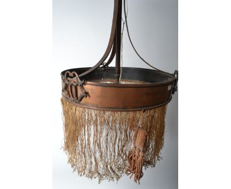A vintage retro 20th century copper ceiling light having a circular band with drop spandrels and curved ceiling supports.