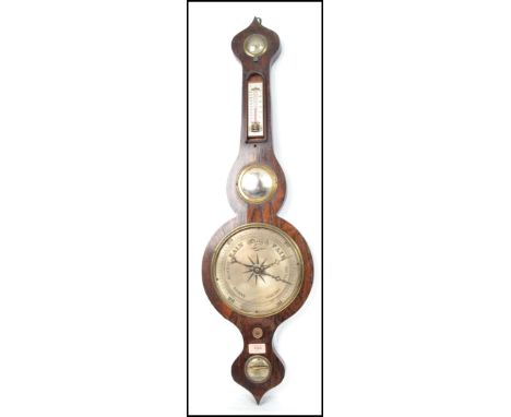 A 19th century Georgian banjo barometer having silvered dial with thermometer having mercury back with door. Measures: 95cm h