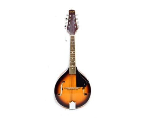 Ukelele Banjo 7 3/4'' head, 16 frets, with plaque on headstock 'George Formby Registered', reverse stamped 'D/1673', wooden r